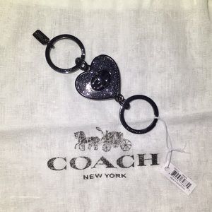 Coach turn lock keychain